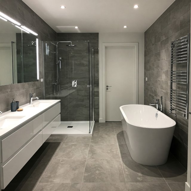Modern master bathroom with freestanding soaking tub and walk in shower bathroom remodelers in the area, bathroom installation contractors, bathroom renovation services near me