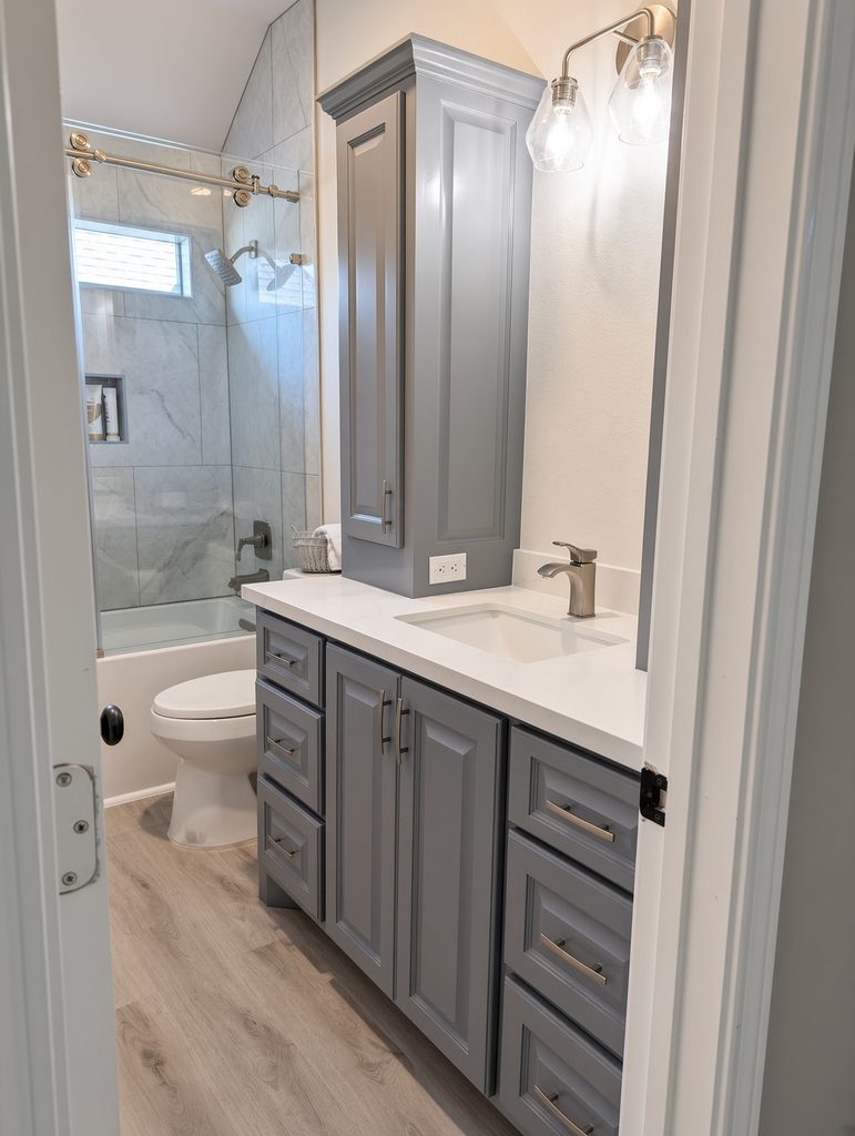 Guest bathroom remodel The Woodlands — deep soaking tub and shower with large-format tile and niche
