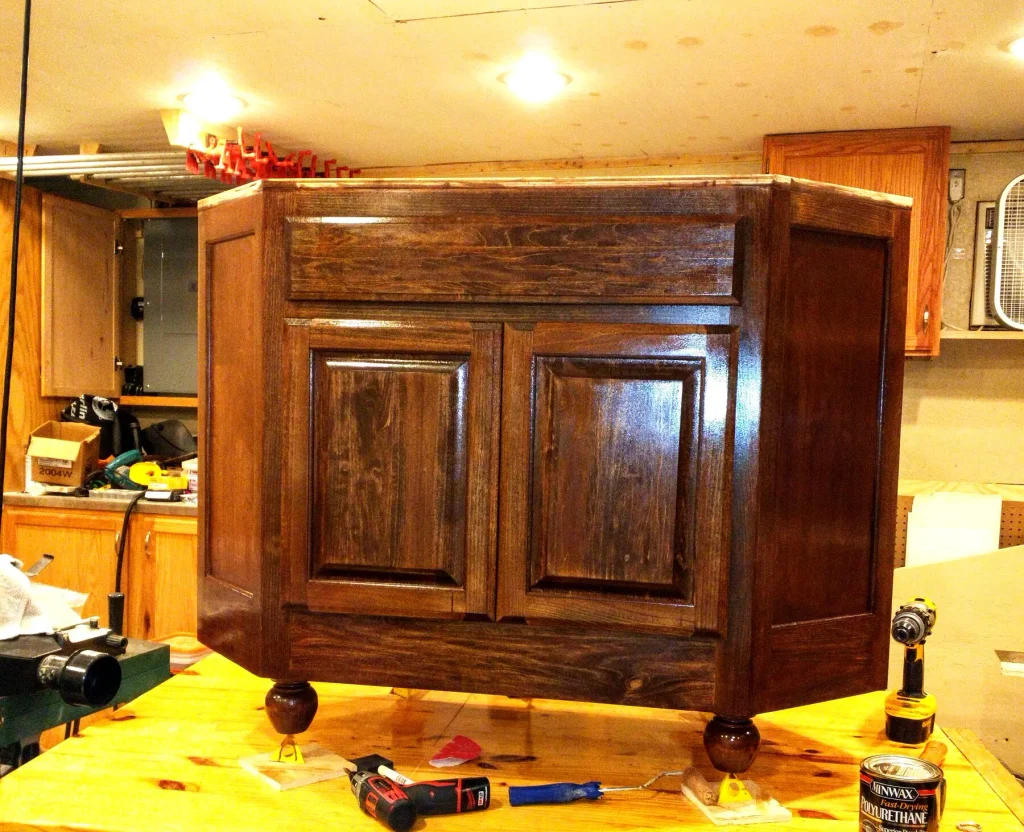 stained: Stained custom guest vanity on the bench, ready to install.