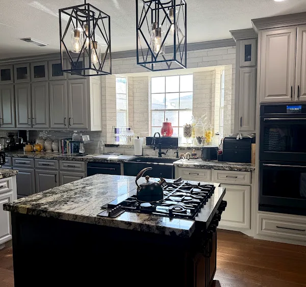 After: gray cabinets with uppers to the ceiling and a new custom island with gas cooktop, Memorial Northwest, Spring/Klein